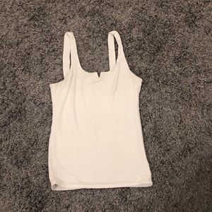 South moon under white tank top!